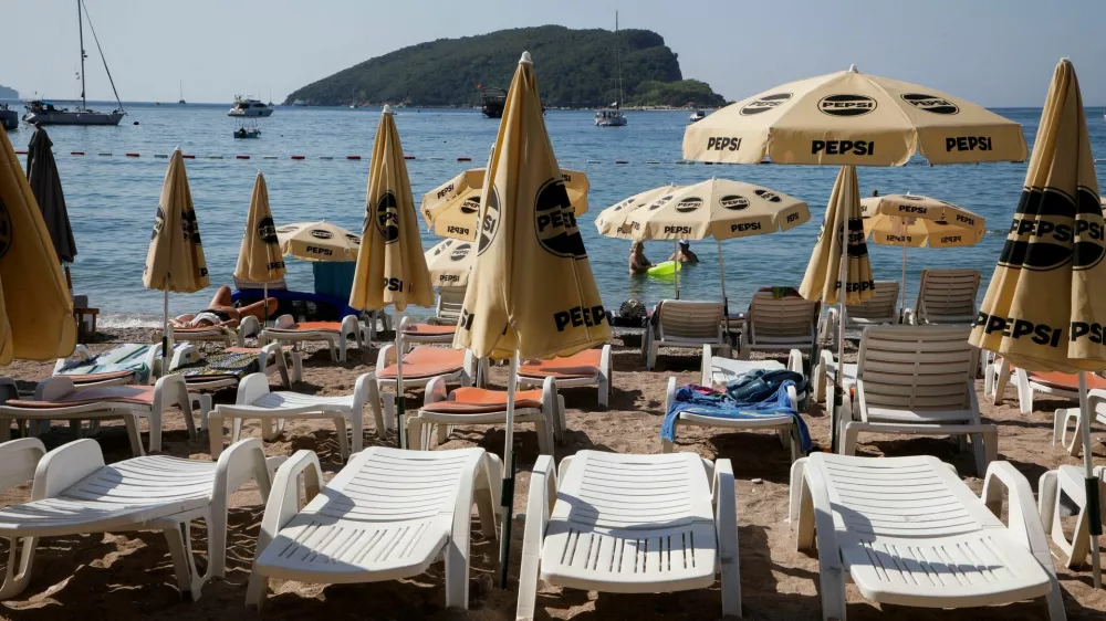 A view shows beach beds for tourists in Slovenska plaza, as Montenegro is hit by an intense heatwave, with soaring temperatures pushing many to escape to the coast, in Budva, Montenegro, July 22, 2025. REUTERS/Stevo Vasiljevic