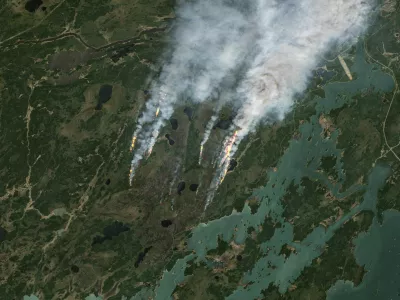 A satellite image shows smoke rising from wildfires in Manitoba, Canada, May 27, 2025. European Union/Copernicus Sentinel-2/Handout via REUTERS  THIS IMAGE HAS BEEN SUPPLIED BY A THIRD PARTY. MANDATORY CREDIT. NO RESALES. NO ARCHIVES. PICTURES HAVE BEEN ENHANCED FROM THE SOURCE TO VISUALISE THE INFRARED EMISSIONS OF THE ACTIVE FIRES.