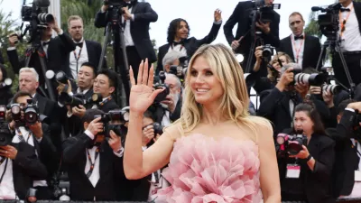 Heidi Klum poses for photographers during the opening ceremony red carpet of the 78th international film festival, Cannes, southern France, Tuesday, May 13, 2025. (Photo by Joel C Ryan/Invision/AP)