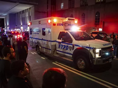 The ambulance carrying the body of Didarul Islam exits NewYork-Presbyterian/Weill Cornell Medical Hospital during the dignified transfer of the slain officer, who was shot and killed by a gunman earlier this evening, early Tuesday, July 29, 2025, in New York. (AP Photo/Angelina Katsanis)