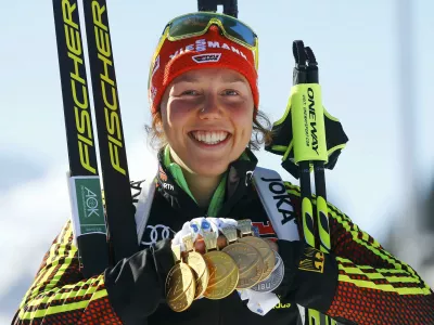 Biathlon - IBU World Championships - Women 12.5 km Mass Start - Hochfilzen, Austria - 19/2/17 - Laura Dahlmeier of Germany displays her medals.  REUTERS/Leonhard Foeger TPX IMAGES OF THE DAY
