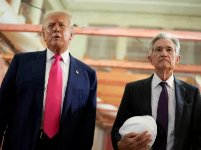FILE PHOTO: U.S. President Donald Trump and Federal Reserve Chair Jerome Powell speak during a tour of the Federal Reserve Board building, which is currently undergoing renovations, in Washington, D.C., U.S., July 24, 2025. REUTERS/Kent Nishimura/File Photo
