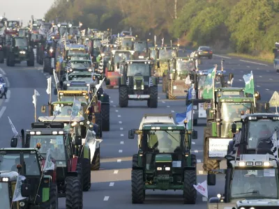 French farmers from western France regions drive their tractors on the A10 motorway, outside Paris, September 3, 2015. Hundreds of tractors were heading towards Paris for a protest due to take place on Thursday where French farmers will call for more help with low prices and high costs in the European Union's largest agricultural producer country.  REUTERS/Jacky Naegelen TPX IMAGES OF THE DAY