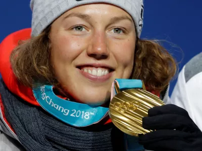 FILE PHOTO: Medals Ceremony - Biathlon - Pyeongchang 2018 Winter Olympics - Women's 10 km Pursuit - Medals Plaza - Pyeongchang, South Korea - February 13, 2018 - Gold medallist Laura Dahlmeier of Germany on the podium. REUTERS/Eric Gaillard/File Photo