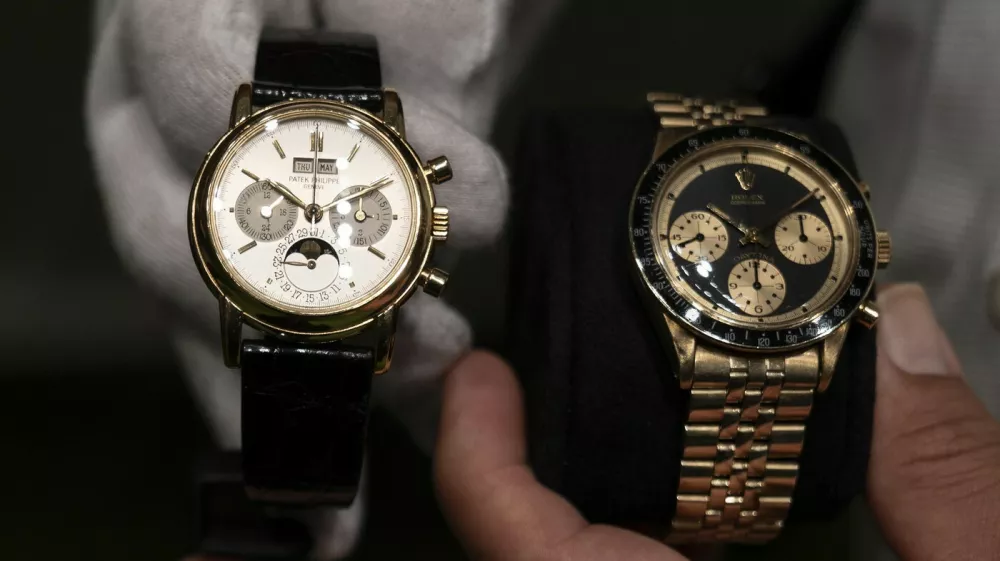 December 5, 2024, New York, New York, USA: Watches & Treasures from Tom Brady - Patek Philippe perpetual calendar and John Player Special Rolex Daytona watches on display during at Sotheby's luxury sales press preview in New York on December 5, 2024,Image: 943545558, License: Rights-managed, Restrictions:, Model Release: no