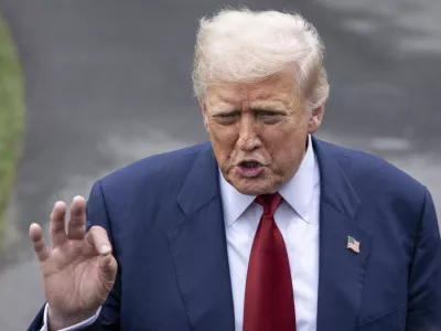 01 August 2025, US, Washington: US President Donald Trump speaks to reporters on the South Lawn of the White House, before departing for Bedminster. Photo: Mehmet Eser/ZUMA Press Wire/dpa