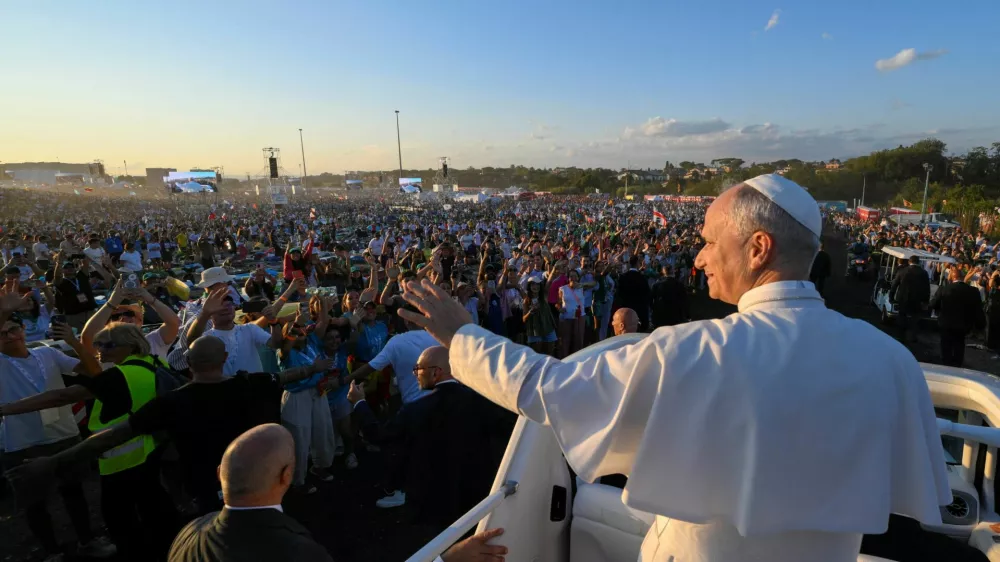 Pope Leo XIV waves to faithful from the popemobile as he attends a vigil for the Jubilee of Youth in Tor Vergata, in Rome, Italy August 2, 2025. Vatican Media/&shy;Handout via REUTERS  ATTENTION EDITORS - THIS IMAGE WAS PROVIDED BY A THIRD PARTY.