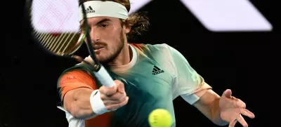 Tennis - Australian Open - Melbourne Park, Melbourne, Australia - January 26, 2022 Greece's Stefanos Tsitsipas in action during his quarter final match against Italy's Jannik Sinner REUTERS/Morgan Sette