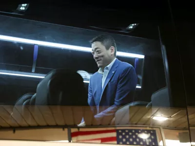 Texas State Rep. Gene Wu sits in a bus after Democratic lawmakers from Texas held a press conference, after leaving their state to deny Republicans the quorum needed to redraw the state's 38 congressional districts, in Carol Stream, Illinois, U.S. August 3, 2025. REUTERS/Tom Krawczyk