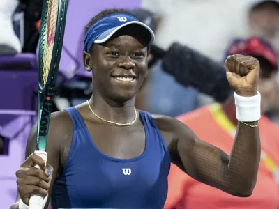 Victoria Mboko, of Canada, reacts after her win over Jessica Bouzas Maneiro, of Spain, during quarterfinal action at the National Bank Open women's tennis tournament in Montreal, Monday, Aug. 4, 2025. (Christinne Muschi/The Canadian Press via AP)