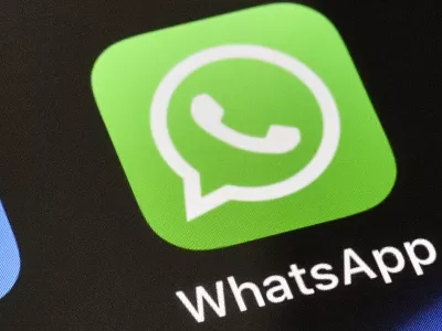FILE - A WhatsApp icon is displayed on an iPhone, Nov. 15, 2018, in Gelsenkirchen, Germany. (AP Photo/Martin Meissner, File)