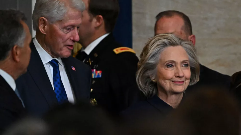 WASHINGTON, DC - JANUARY 20: Former President Bill Clinton and former Secretary of State Hillary Clinton arrive at the 60th inaugural ceremony where Donald Trump will be sworn in as the 47th president on January 20, 2025, in the US Capitol Rotunda in Washington, DC. Ricky Carioti/Pool via REUTERS