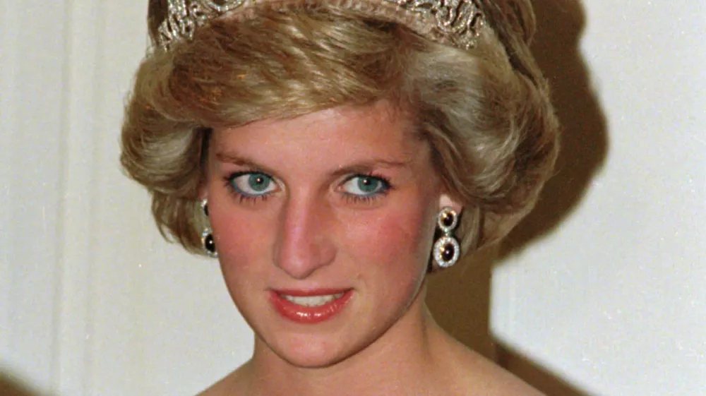 Britain's Princess Diana wears the Spencer tiara as she and Prince Charles attend state dinner at Government House in Adelaide, Austraila, Nov. 7, 1985. (AP Photo/Jim Bourdier)