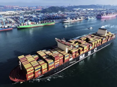 A MSC container ship sails off from a container terminal, in Qingdao in east China's Shandong province on July 25, 2025. (Chinatopix Via AP)