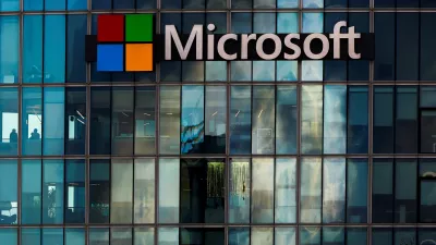 A view shows a Microsoft logo at Microsoft offices in Issy-les-Moulineaux near Paris, France, January 9, 2025. REUTERS/Gonzalo Fuentes