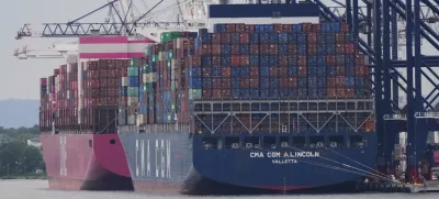 Cargo ships are docked at Port Liberty Terminals, Wednesday, Aug. 6, 2025, in New York. (AP Photo/Frank Franklin II)