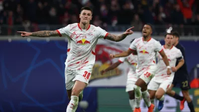 02 October 2024, Saxony, Leipzig: Leipzig's Benjamin Sesko celebrates scoring his side's second goal during the UEFA Champions League soccer match between RB Leipzig and Juventus at the Red Bull Arena. Photo: Jan Woitas/dpa