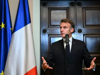 French President Emmanuel Macron speaks at a press conference with German Chancellor Friedrich Merz (not pictured), at Villa Borsig in Berlin, Germany, July 23, 2025. REUTERS/Annegret Hilse