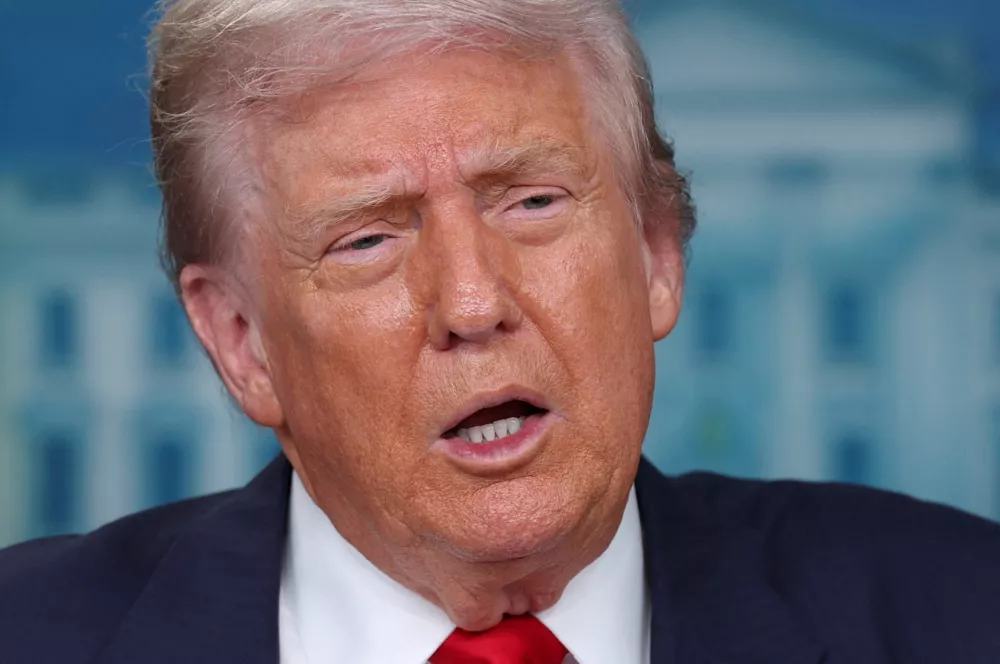U.S. President Donald Trump speaks to the press about deploying federal law enforcement agents in Washington to bolster the local police presence, in the Press Briefing Room at the White House, in Washington D.C., U.S., August 11, 2025. REUTERS/Jonathan Ernst