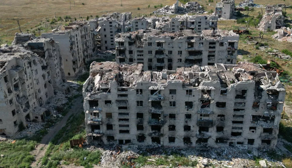 A drone view shows the ruins of residential buildings in the abandoned town of Marinka (Maryinka), which was destroyed in the course of Russia-Ukraine conflict in the Donetsk region, a Russian-controlled area of Ukraine, August 7, 2025. REUTERS/Alexander Ermochenko