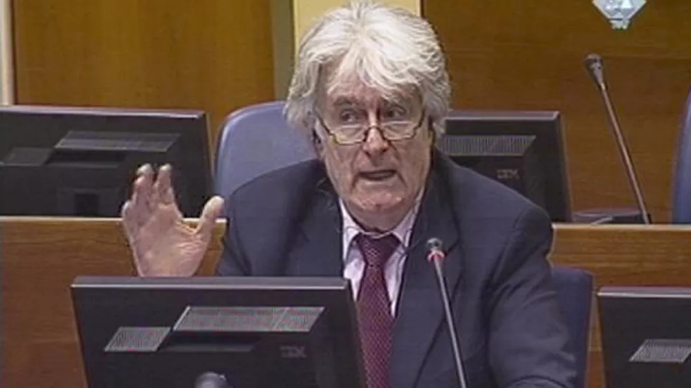 A video grab shows wartime Bosnian Serb leader Radovan Karadzic as he takes the stand at his war crimes trial at The Hague March 1, 2010. Karadzic, who rejects responsibility for some of Europe's worst atrocities since World War Two, denies the 11 charges against him, including two of genocide, for his actions during the Bosnian War of 1992-95, which pitted Serbs against Muslims and Croats.  REUTERS/ICTY via Reuters TV (NETHERLANDS - Tags: CIVIL UNREST POLITICS CRIME LAW) FOR EDITORIAL USE ONLY. NOT FOR SALE FOR MARKETING OR ADVERTISING CAMPAIGNS