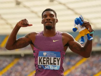 FILE PHOTO: Athletics - Diamond League - Silesia - Silesian Stadium, Chorzow, Poland - August 25, 2024 Fred Kerley of the U.S. celebrates after winning the men's 100m REUTERS/Aleksandra Szmigiel/File Photo