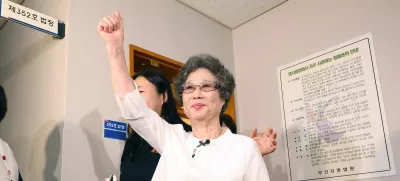 Choi Mal-ja (C), who was convicted 61 years ago for biting off the tongue of her attempted rapist, reacts after her retrial hearing at the Busan District Court in Busan on July 23, 2025. A South Korean court reopened a decades-old case on July 23, after the country's #MeToo movement inspired a woman to challenge her conviction for defending herself against sexual violence 61 years ago.,Image: 1024835661, License: Rights-managed, Restrictions: - South Korea OUT / NO ARCHIVES - RESTRICTED TO SUBSCRIPTION USE, Model Release: no