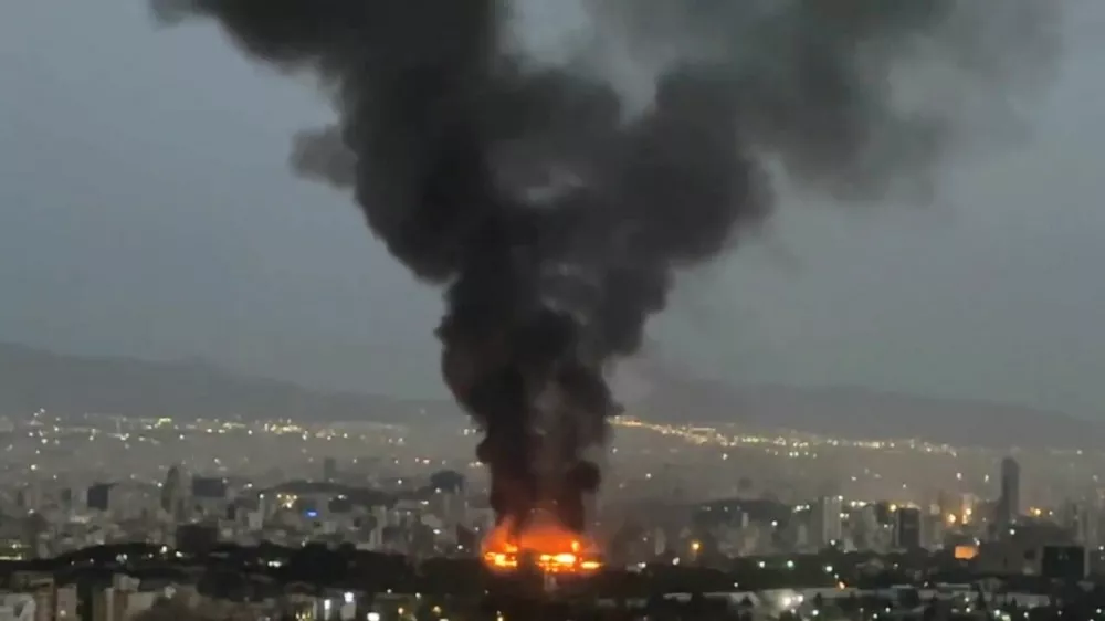 Smoke rises from a fire, as the Israel-Iran air war continues, in Tehran, Iran, in this still image obtained from social media video released June 17, 2025. Social Media/via REUTERS THIS IMAGE HAS BEEN SUPPLIED BY A THIRD PARTY. NO RESALES. NO ARCHIVES. NEWS USE ONLY