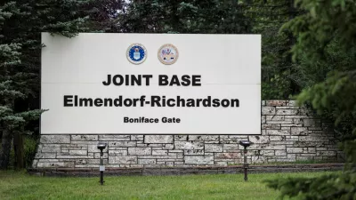 A sign sits at Joint Base Elmendorf-Richardson is seen ahead of a planned meeting between U.S. President Donald Trump and Russian President Vladimir Putin to discuss the war in Ukraine, in Anchorage, Alaska, U.S., August 13, 2025. REUTERS/Jeenah Moon