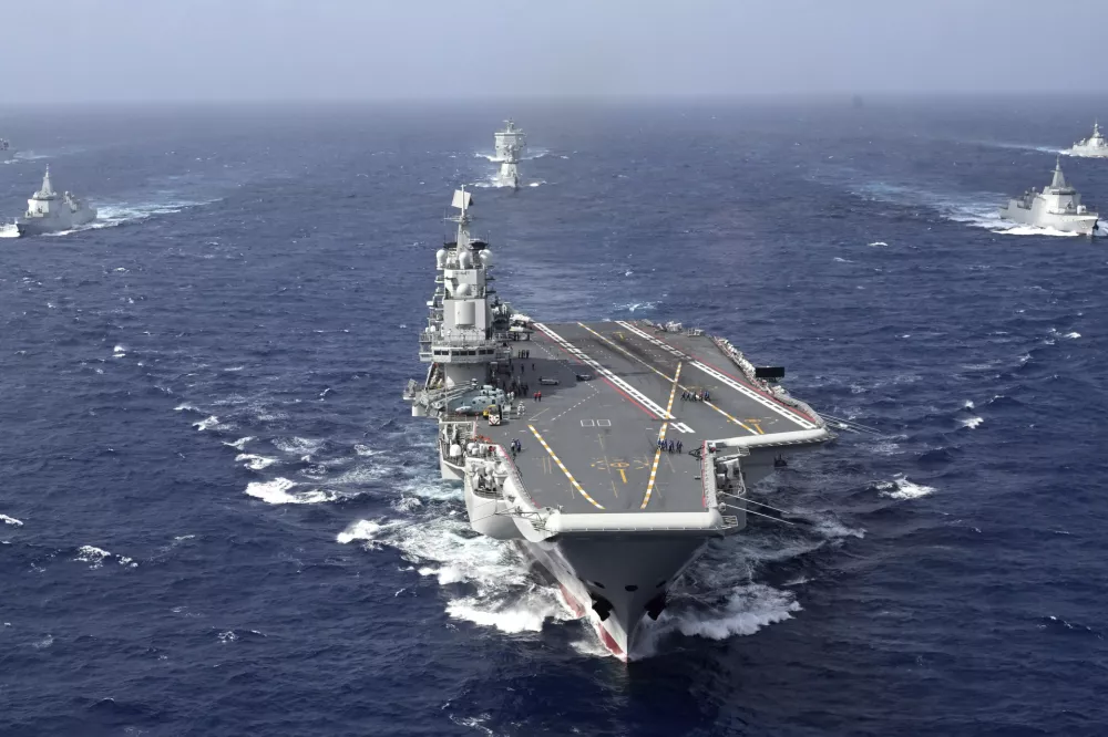 FILE - In this photo released by Xinhua News Agency, conventionally powered Chinese aircraft carrier Liaoning carries out a dual aircraft carrier formation exercise with the Shandong aircraft carrier, unseen, for the first time in the South China Sea in late October 2024. (Pu Haiyang/Xinhua via AP,File)
