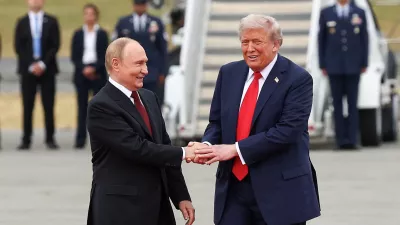 U.S. President Donald Trump shakes hand with Russian President Vladimir Putin, as they meet to negotiate for an end to the war in Ukraine, at Joint Base Elmendorf-Richardson in Anchorage, Alaska, U.S., August 15, 2025. REUTERS/Kevin Lamarque