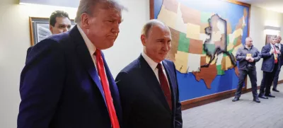 HANDOUT - 15 August 2025, US, Alaska: Russian President Vladimir Putin (R) and US President Donald Trump walk to a joint press conference with US President Donald Trump at Joint Base Elmendorf-Richardson in Alaska. Photo: -/Kremlin/dpa - ATTENTION: editorial use only and only if the credit mentioned above is referenced in full