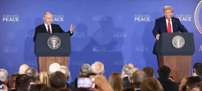 HANDOUT - 15 August 2025, US, Alaska: US President Donald Trump (R) and Russian President Vladimir Putin attend a press conference at Joint Base Elmendorf-Richardson following their meeting in Alaska. Photo: -/Kremlin/dpa - ATTENTION: editorial use only and only if the credit mentioned above is referenced in full
