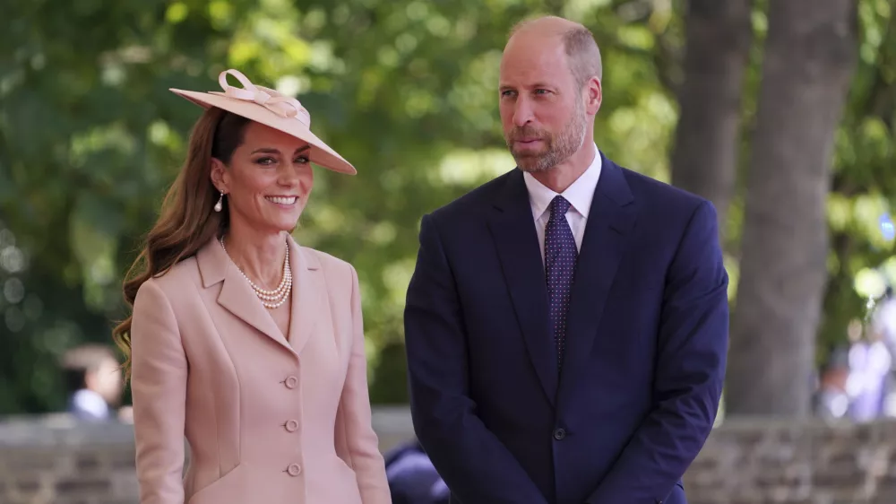 Britain's Kate, Princess of Wales and Prince William join Britain's King Charles III and Queen Camilla to welcome French President Emmanuel Macron and his wife Brigitte to Windsor Castle in Windsor, England, Tuesday, July 8, 2025.(AP Photo/Alberto Pezzali, Pool)