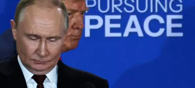 FILE PHOTO: U.S. President Donald Trump and Russian President Vladimir Putin hold a press conference following their meeting to negotiate an end to the war in Ukraine, at Joint Base Elmendorf-Richardson in Anchorage, Alaska, U.S., August 15, 2025. REUTERS/Jeenah Moon/File Photo