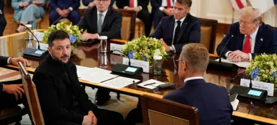 Ukrainian President Volodymyr Zelenskiy speaks during a meeting with U.S. President Donald Trump, French President Emmanuel Macron, British Prime Minister Keir Starmer, and Finland's President Alexander Stubb amid negotiations to end the Russian war in Ukraine, at the White House in Washington, D.C., U.S., August 18, 2025. REUTERS/Al Drago