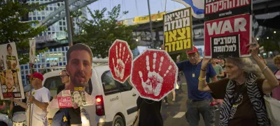 Supporters of Israeli hostages held in the Gaza Strip attend a rally demanding their release from Hamas captivity and calling for an end to the war, in Tel Aviv, Israel, Tuesday, Aug. 19, 2025. (AP Photo/Ohad Zwigenberg)