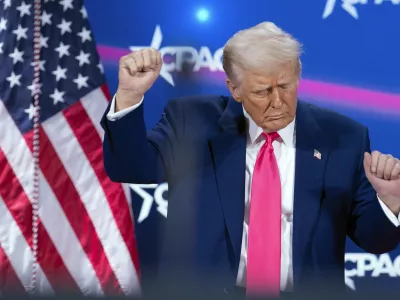 President Donald Trump dances after speaking at the Conservative Political Action Conference, CPAC, at the Gaylord National Resort & Convention Center, Saturday, Feb. 22, 2025, in Oxon Hill, Md. (AP Photo/Jose Luis Magana)
