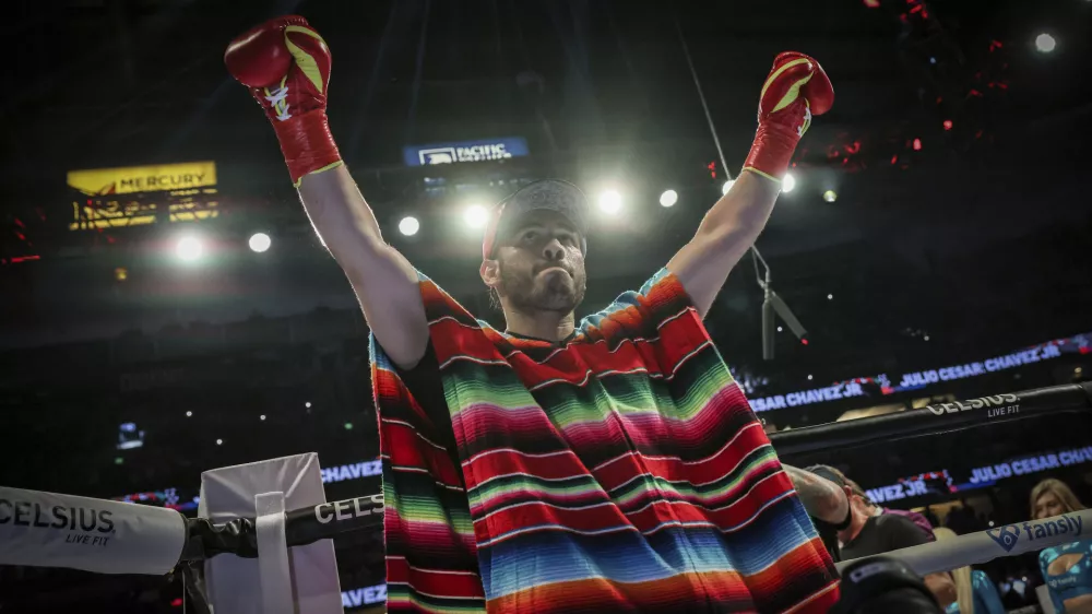 FILE - Julio Cesar Chavez Jr. arrives for his cruiserweight boxing match against Jake Paul, in Anaheim, Calif., June 28, 2025. (AP Photo/Etienne Laurent, File)