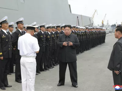 In this photo provided by the North Korean government, North Korean leader Kim Jong Un, center, inspects the warship Choe Hyon in Nampo, North Korea, on Aug. 18, 2025. Independent journalists were not given access to cover the event depicted in this image distributed by the North Korean government. The content of this image is as provided and cannot be independently verified. Korean language watermark on image as provided by source reads: "KCNA" which is the abbreviation for Korean Central News Agency. (Korean Central News Agency/Korea News Service via AP)