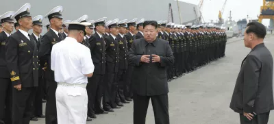 In this photo provided by the North Korean government, North Korean leader Kim Jong Un, center, inspects the warship Choe Hyon in Nampo, North Korea, on Aug. 18, 2025. Independent journalists were not given access to cover the event depicted in this image distributed by the North Korean government. The content of this image is as provided and cannot be independently verified. Korean language watermark on image as provided by source reads: "KCNA" which is the abbreviation for Korean Central News Agency. (Korean Central News Agency/Korea News Service via AP)