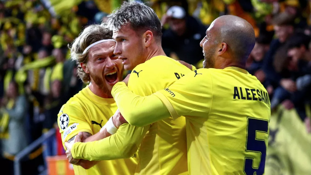 Soccer Football - UEFA Champions League - Play Off - First Leg - Bodo/Glimt v SK Sturm Graz - Aspmyra Stadion,&nbsp;Bodo, Norway - August 20, 2025 Bodo/Glimt's Odin Bjortuft celebrates scoring their second goal with teammates Mats Torbergsen/NTB via REUTERS  ATTENTION EDITORS - THIS IMAGE WAS PROVIDED BY A THIRD PARTY. NORWAY OUT. NO COMMERCIAL OR EDITORIAL SALES IN NORWAY.