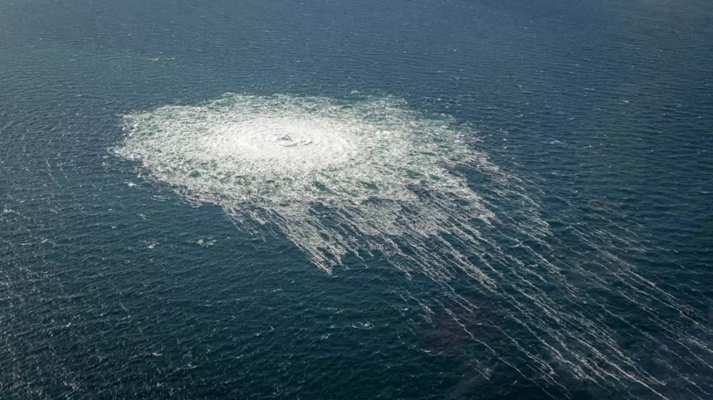 FILE PHOTO: Gas bubbles from the Nord Stream 2 leak reaching surface of the Baltic Sea in the area shows disturbance of well over one kilometre diameter near Bornholm, Denmark, September 27, 2022. Danish Defence Command/Handout via REUTERS/File Photo