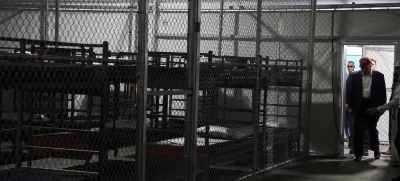 FILE - President Donald Trump tours "Alligator Alcatraz," a new migrant detention facility at Dade-Collier Training and Transition facility, on July 1, 2025, in Ochopee, Fla. (AP Photo/Evan Vucci, File)