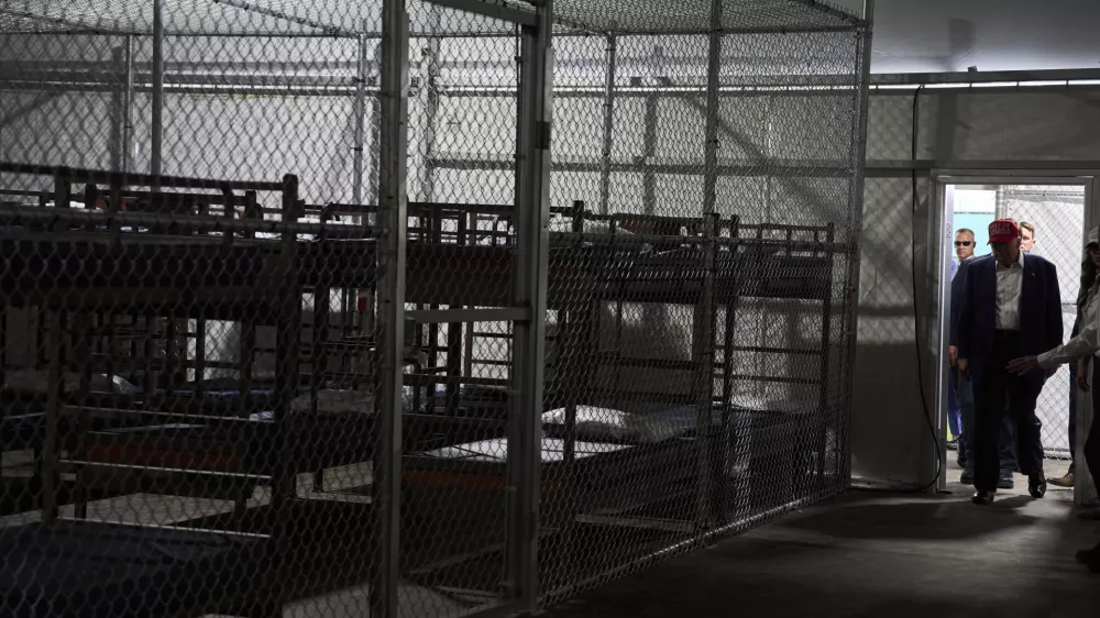 FILE - President Donald Trump tours "Alligator Alcatraz," a new migrant detention facility at Dade-Collier Training and Transition facility, on July 1, 2025, in Ochopee, Fla. (AP Photo/Evan Vucci, File)