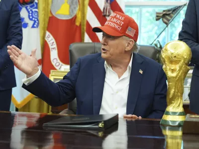 President Donald Trump speaks in the Oval Office of the White House, Friday, Aug. 22, 2025, in Washington. (AP Photo/Jacquelyn Martin)