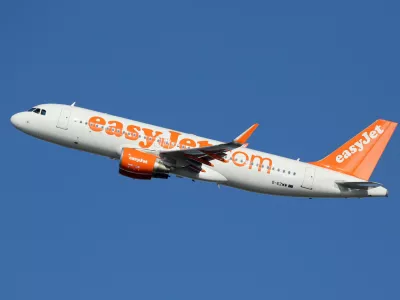 Barcelona, Spain - December 11, 2014: An easyJet Airbus A320 with the registration G-EZWW taking off from Barcelona Airport (BCN). EasyJet is a British low-cost airline with its headquarters near London and some 240 planes in operation.
