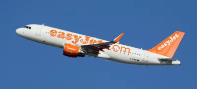 Barcelona, Spain - December 11, 2014: An easyJet Airbus A320 with the registration G-EZWW taking off from Barcelona Airport (BCN). EasyJet is a British low-cost airline with its headquarters near London and some 240 planes in operation.