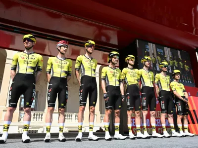 Cycling - Vuelta a Espana - Stage 1 - Turin to Novara - Novara, Italy - August 23, 2025 Team Visma | Lease a Bike's Jonas Vingegaard, Axel Zingle, Victor Campenaerts, Matteo Jorgenson, Wilco Kelderman, Sepp Kuss, Ben Tulett and Dylan van Baarle before the start of stage 1 REUTERS/Alberto Lingria