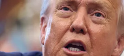 FILE PHOTO: U.S. President Donald Trump delivers remarks in the Oval Office at the White House in Washington, D.C., U.S., August 14, 2025. REUTERS/Kevin Lamarque/File Photo